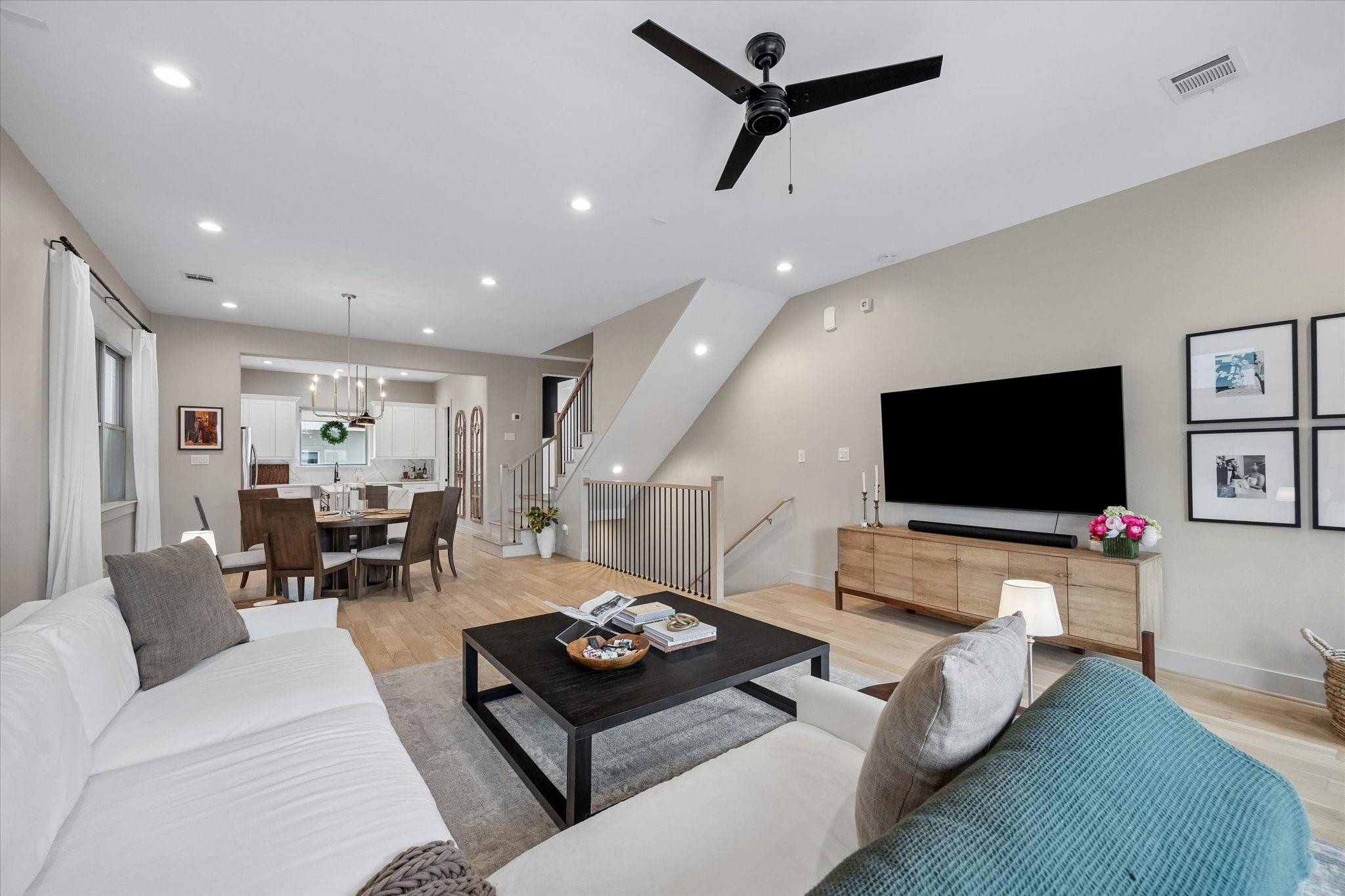 2407 Bevis Street Houston, TX 77008 - Photo 9 of 34 a living room with furniture and a flat screen tv