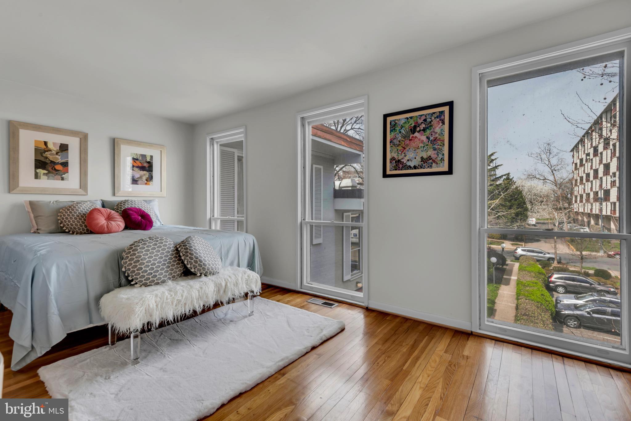 164 G Street Southwest, Unit 144 Washington, DC 20024 - Photo 19 of 67 Floor to Ceiling Windows in Primary Bedroom