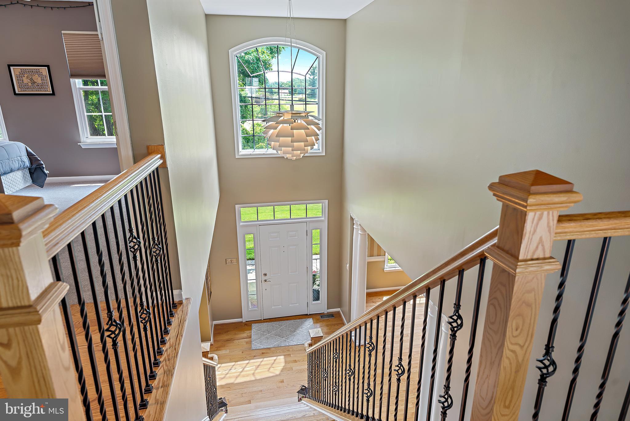 6490 South Trotter Road Clarksville, MD 21029 - Photo 24 of 57 Open Two Story Foyer - Custom Chandelier