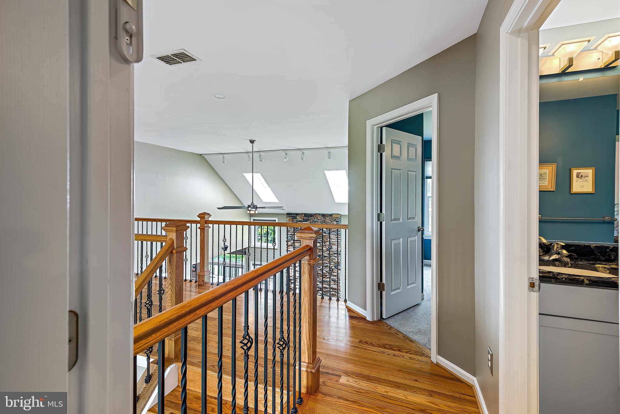 6490 South Trotter Road Clarksville, MD 21029 - Photo 25 of 57 Top Floor Hallway - Hardwood Floors