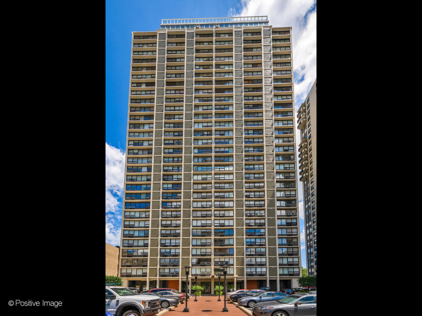 5733 North Sheridan Road, Unit 22C Chicago, IL 60660 - Photo 1 of 29 a view of a building from the windows