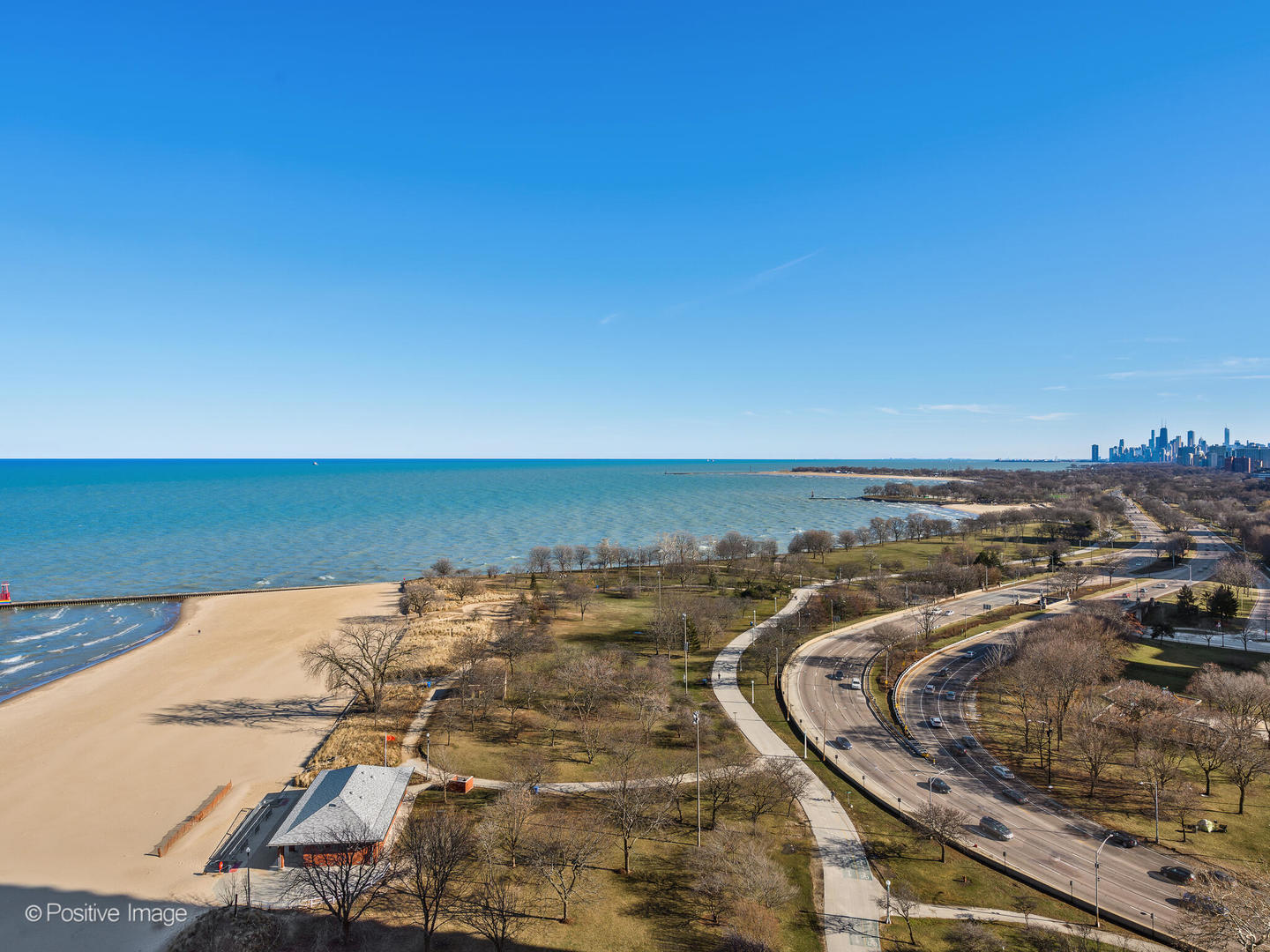 5733 North Sheridan Road, Unit 22C Chicago, IL 60660 - Photo 22 of 29 a view of a ocean view with beach