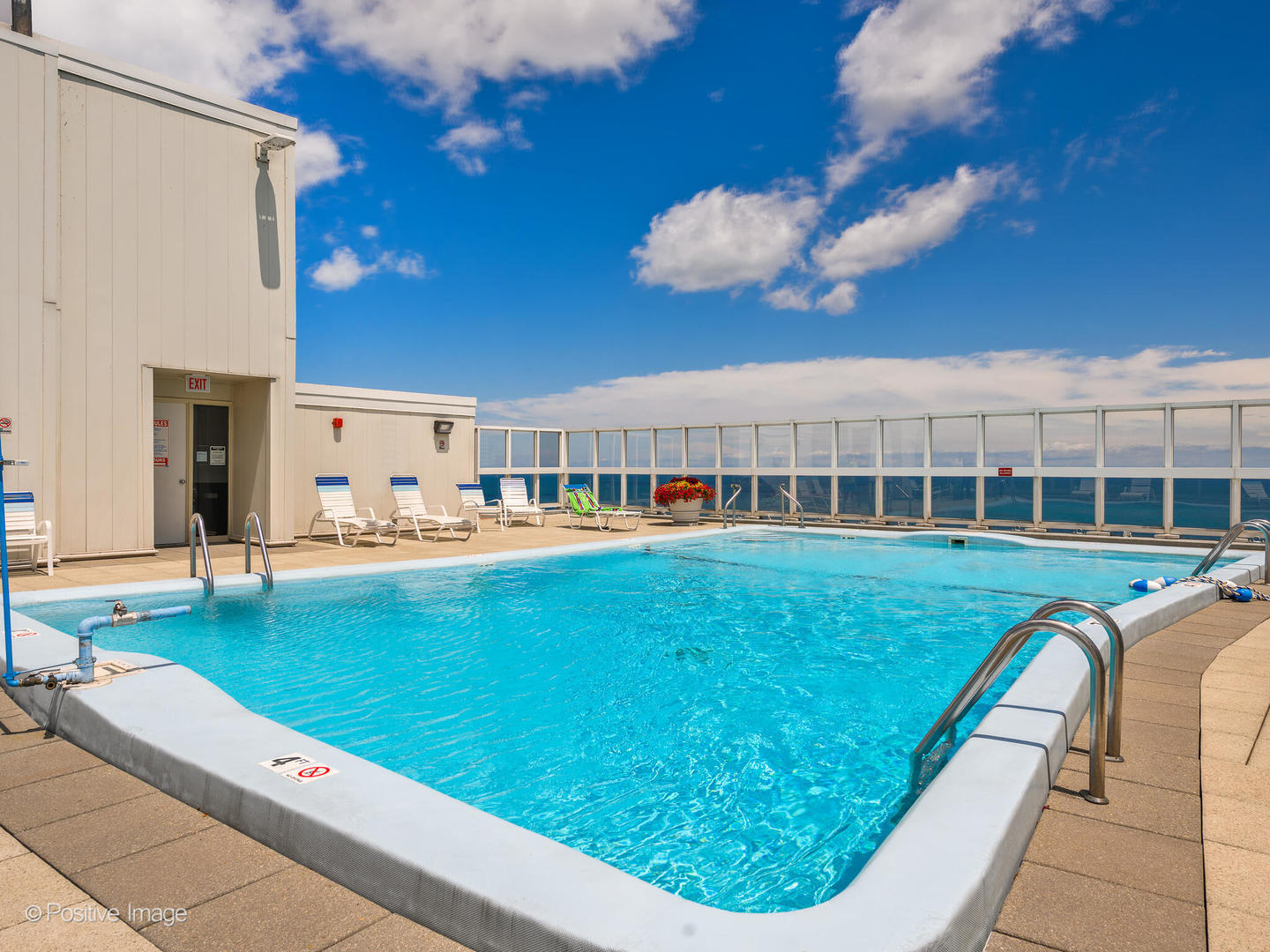 5733 North Sheridan Road, Unit 22C Chicago, IL 60660 - Photo 25 of 29 a view of a house with a swimming pool