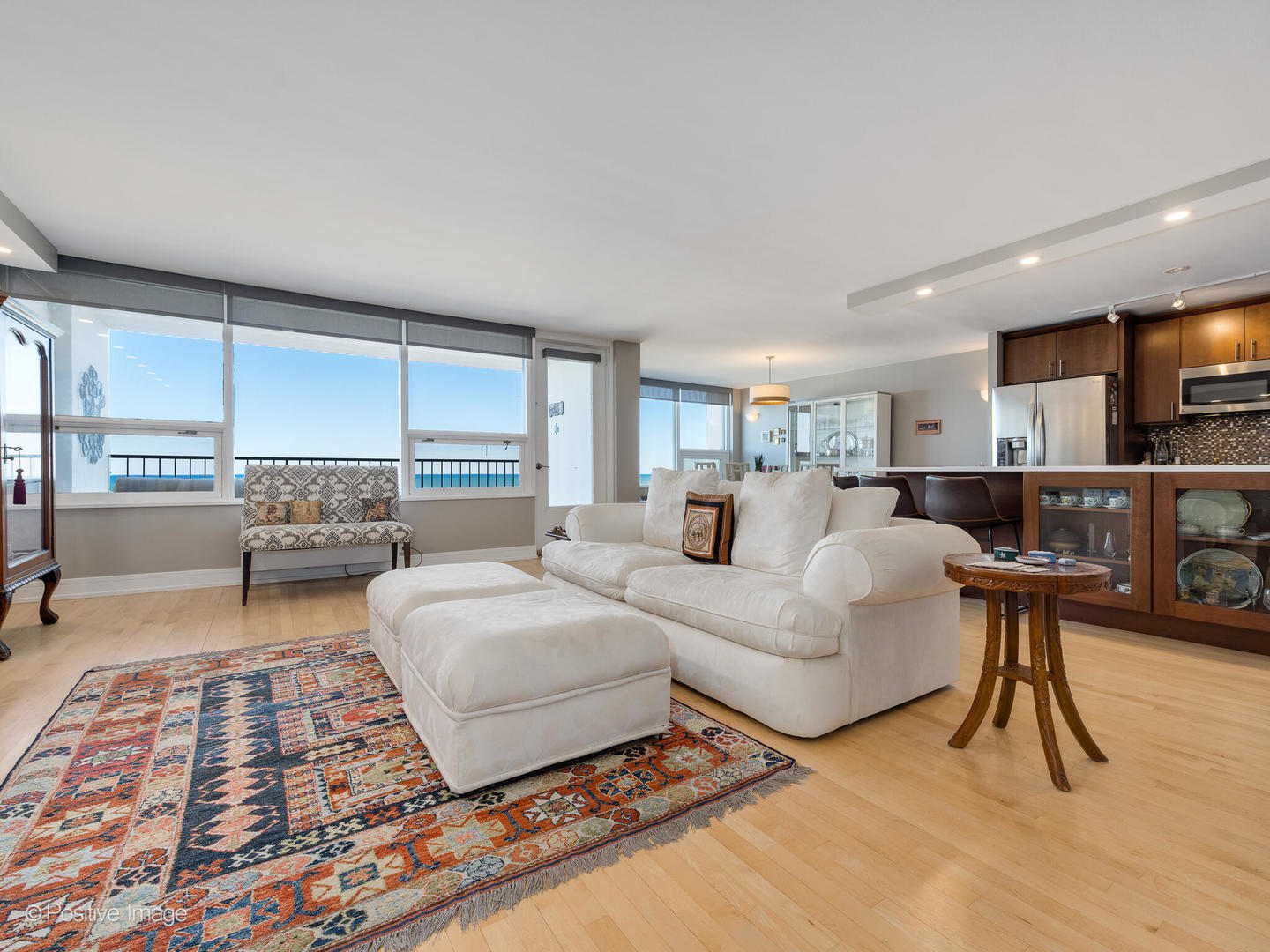 5733 North Sheridan Road, Unit 22C Chicago, IL 60660 - Photo 3 of 29 a living room with furniture and a large window