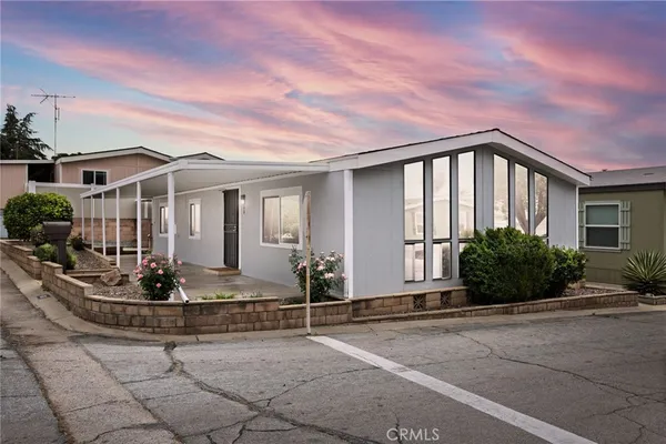 a front view of a house with entertaining space