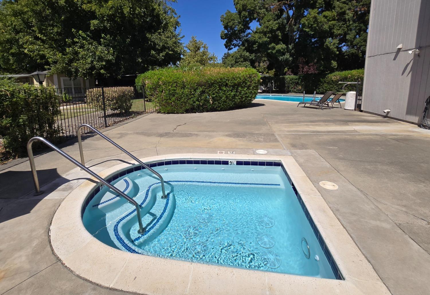 189 Full Circle Davis, CA 95618 - Photo 28 of 29 a view of swimming pool with a patio