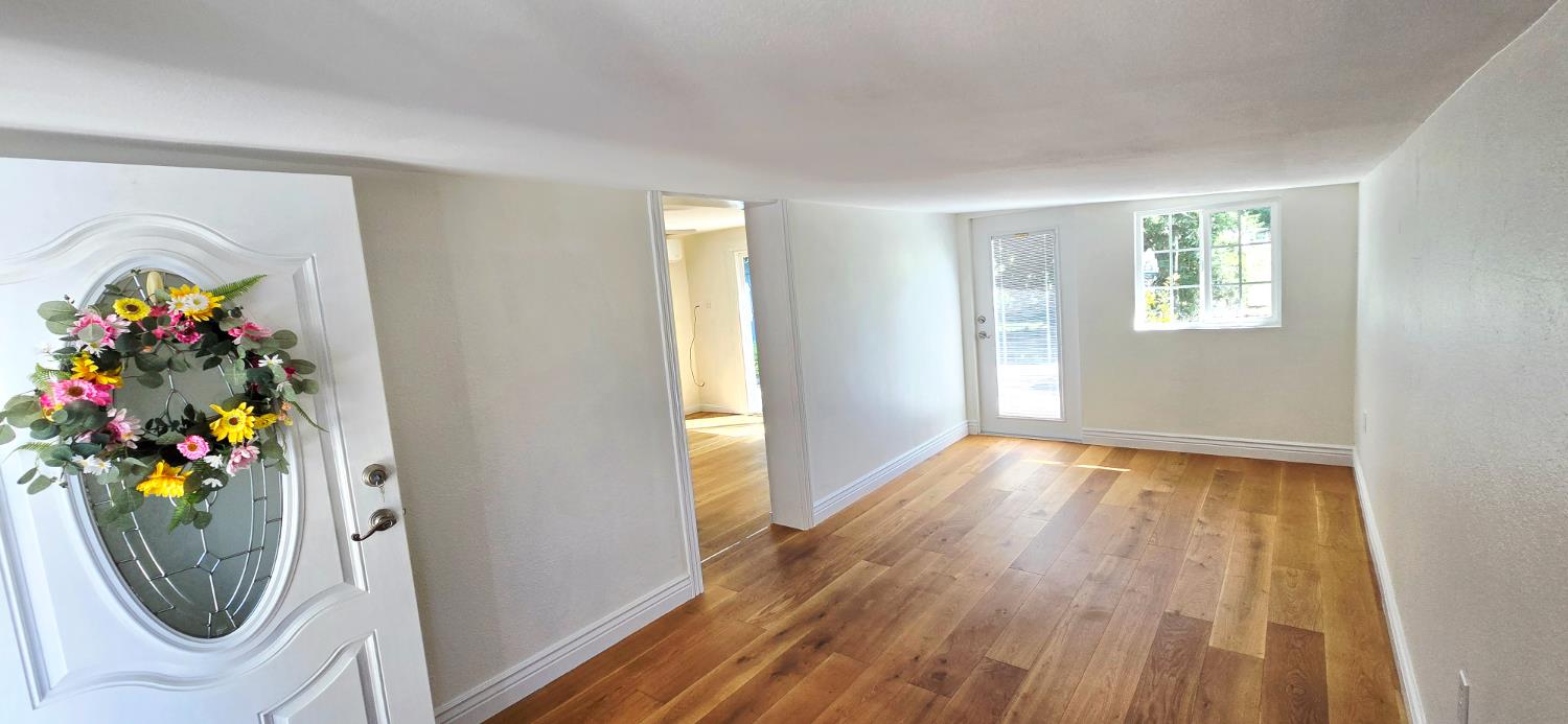 189 Full Circle Davis, CA 95618 - Photo 7 of 29 a view of an entryway with wooden floor