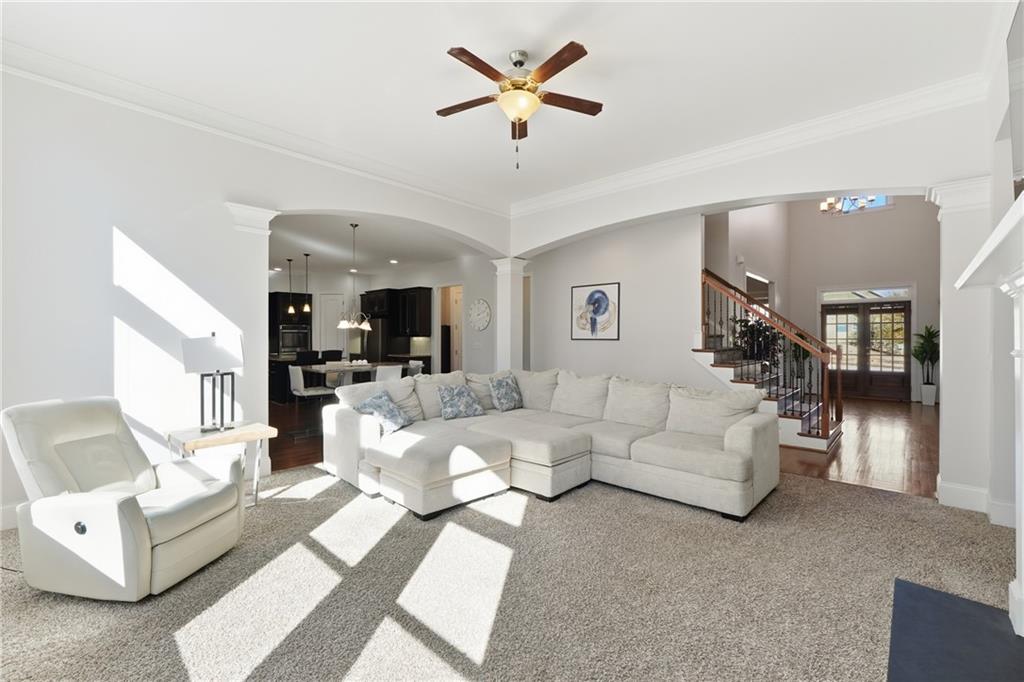 4409 Talisker Lane Acworth, GA 30101 - Photo 12 of 61 a living room with furniture and white walls