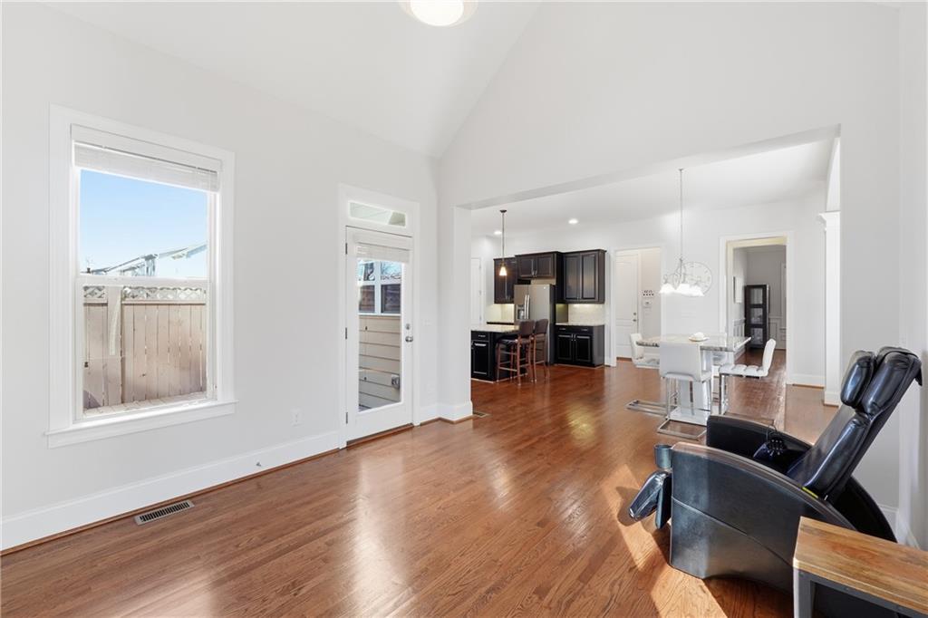 4409 Talisker Lane Acworth, GA 30101 - Photo 21 of 61 a living room with furniture and a wooden floor
