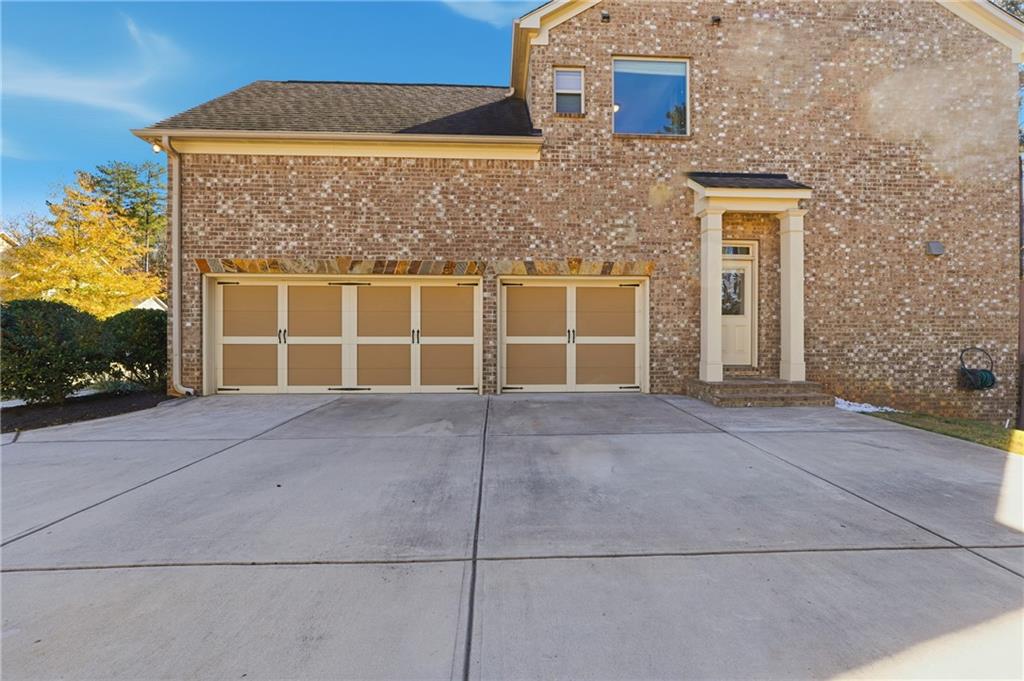 4409 Talisker Lane Acworth, GA 30101 - Photo 4 of 61 front view of a brick house