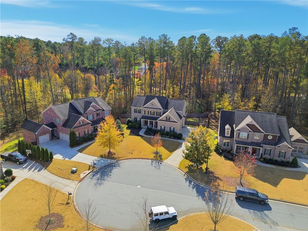 4409 Talisker Lane Acworth, GA 30101 - Photo 50 of 61 a view of a house with pool and chairs