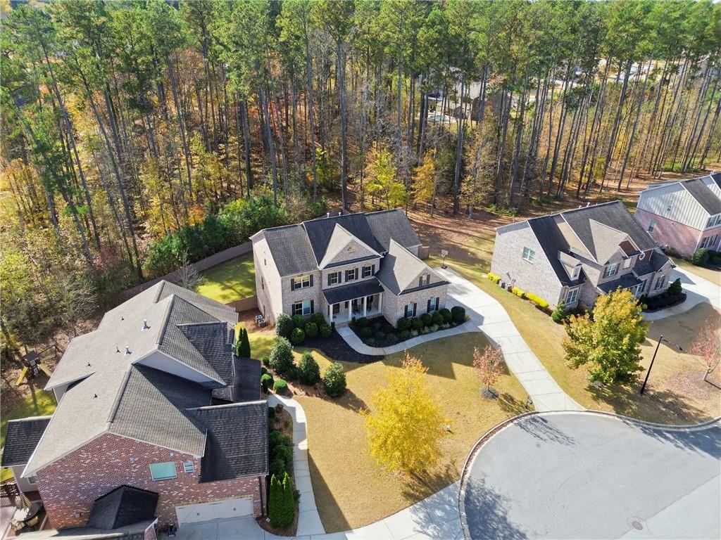 4409 Talisker Lane Acworth, GA 30101 - Photo 51 of 61 an aerial view of a house with swimming pool and large trees