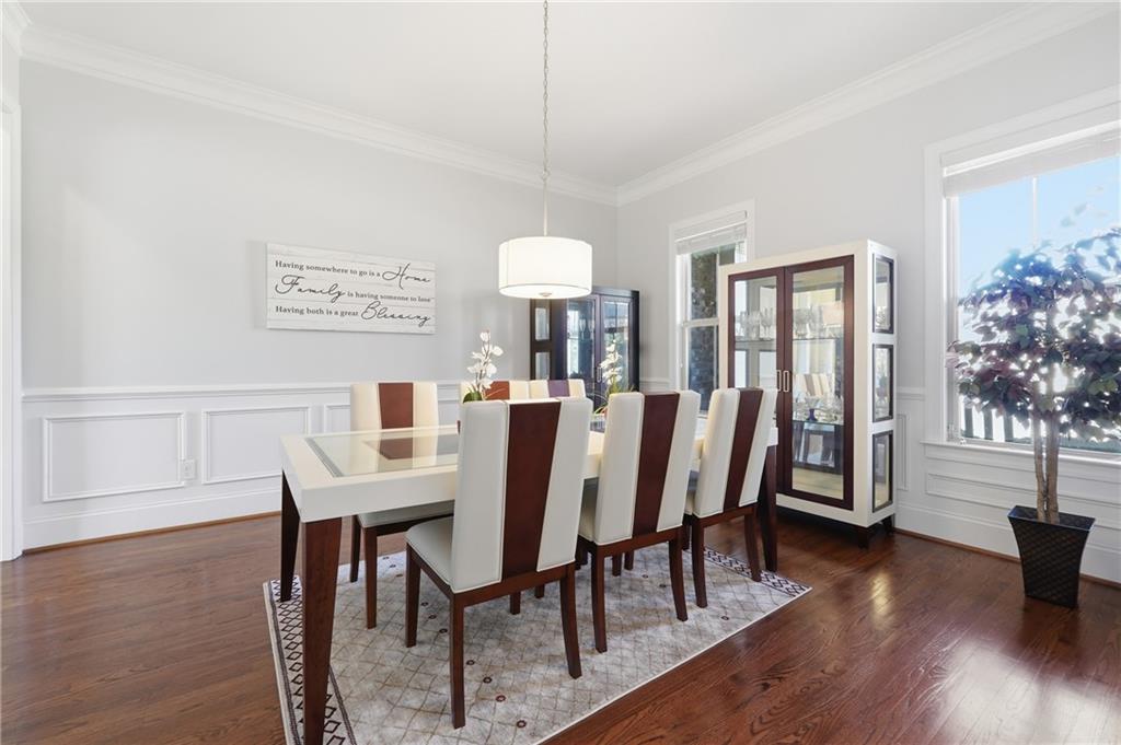 4409 Talisker Lane Acworth, GA 30101 - Photo 8 of 61 a view of a dining room with furniture window and wooden floor