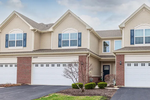 front view of a house and a yard