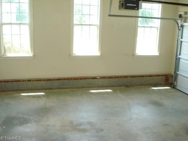 712 Number Ten Way Oak Ridge, NC 27310 - Photo 3 of 30 Garage