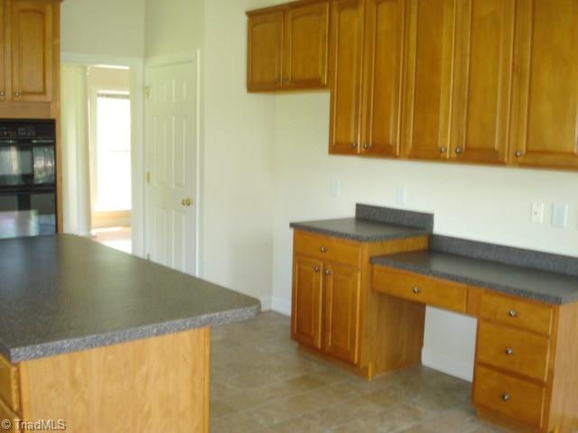 712 Number Ten Way Oak Ridge, NC 27310 - Photo 8 of 30 Kitchen