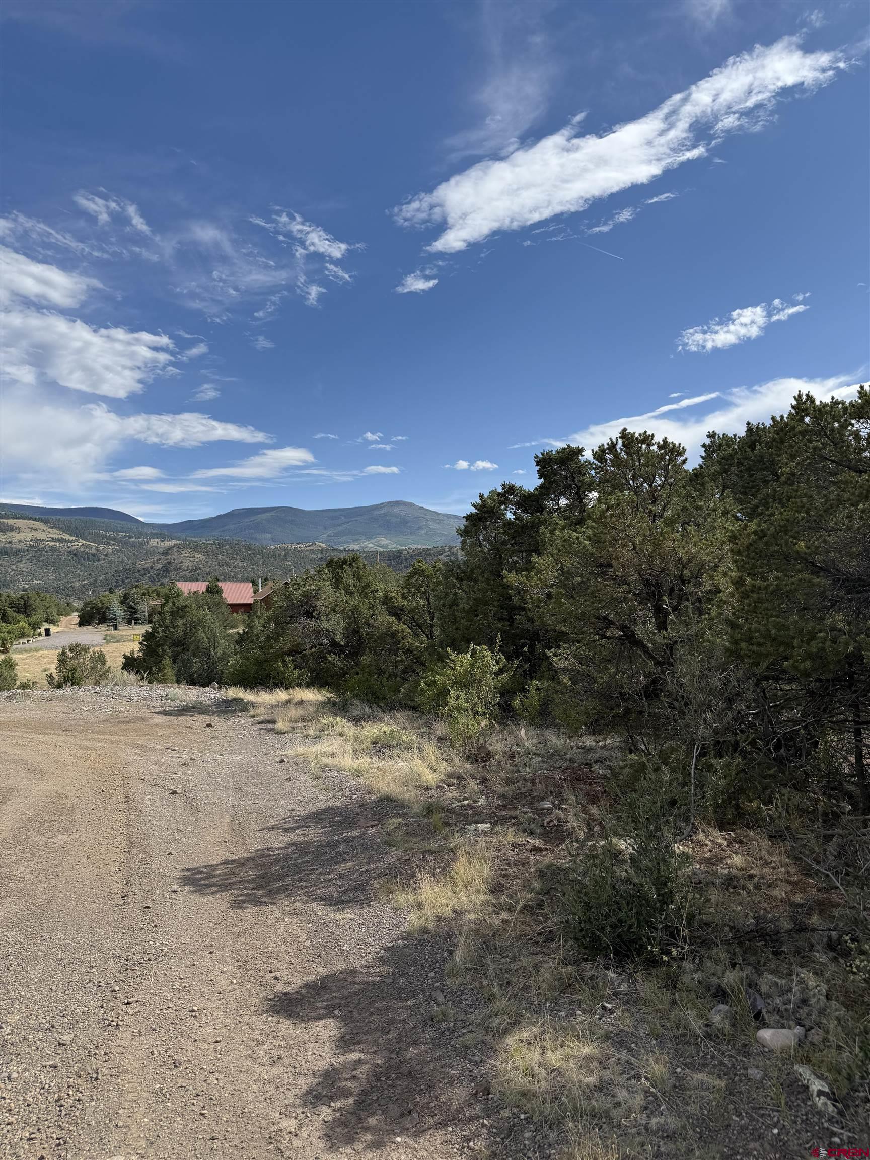 729 Vail Pass Road South Fork, CO 81154 - Photo 3 of 7 a view of a beach in front of a house