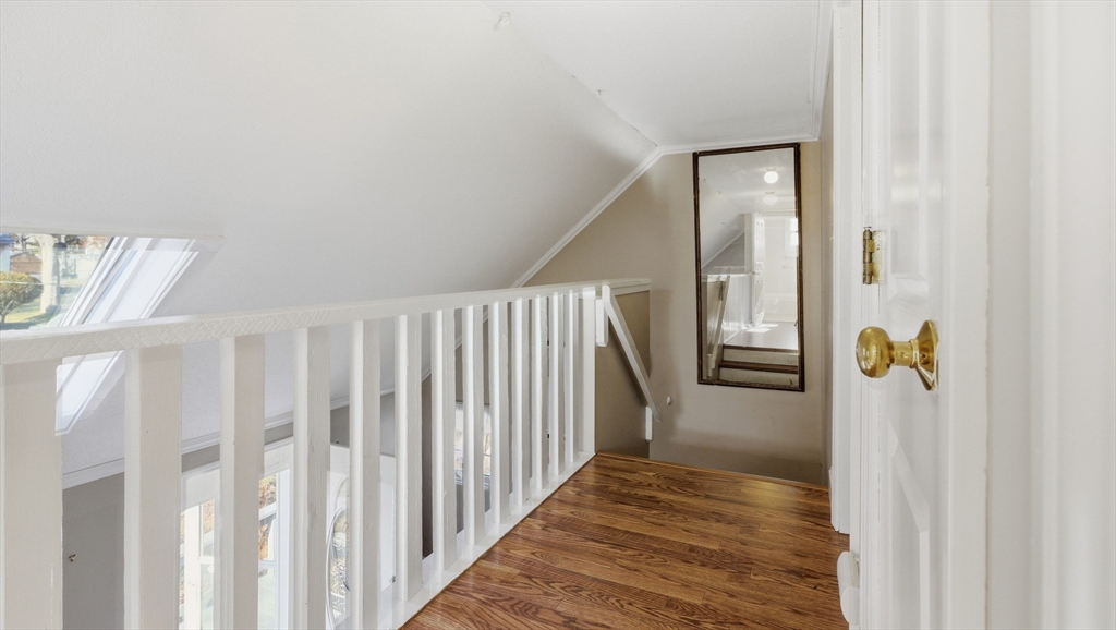 292 Megan Road Barnstable, MA 02601 - Photo 6 of 12 a view of hallway with wooden floor
