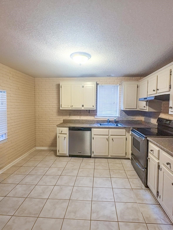 292 Megan Road Barnstable, MA 02601 - Photo 9 of 12 a large kitchen with granite countertop a stove a sink dishwasher and a refrigerator