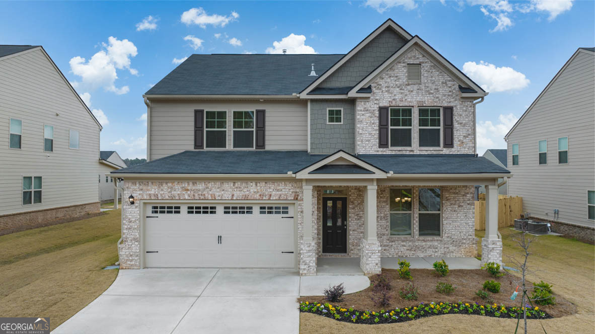1817 Quaker Street Hampton, GA 30228 - Photo 1 of 1 a front view of a house with a porch