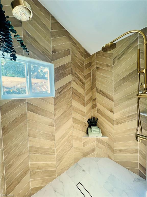 1155 12th Street North Naples, FL 34102 - Photo 12 of 18 Full bath with tiled shower
