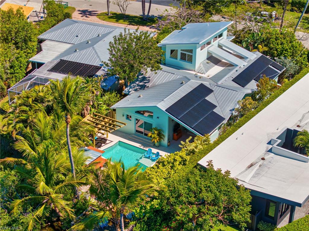 1155 12th Street North Naples, FL 34102 - Photo 3 of 18 View from above of property featuring a pool
