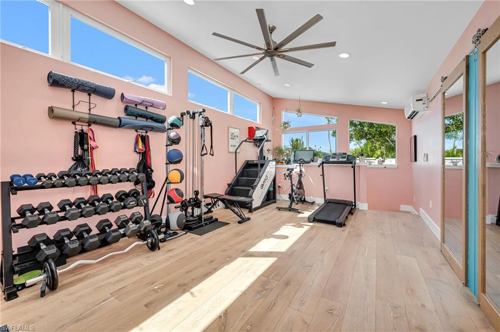 1155 12th Street North Naples, FL 34102 - Photo 9 of 18 Workout room featuring recessed lighting and a ceiling fan