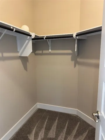 a bathroom with sink toilet and mirror