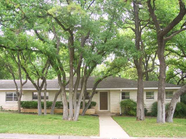 503 Riley Road Austin, TX 78746 - Photo 1 of 1 front view of a house with a yard