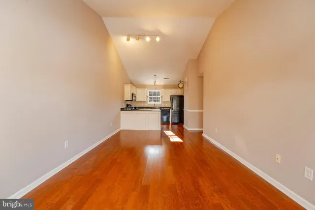 a view of kitchen with wooden floor