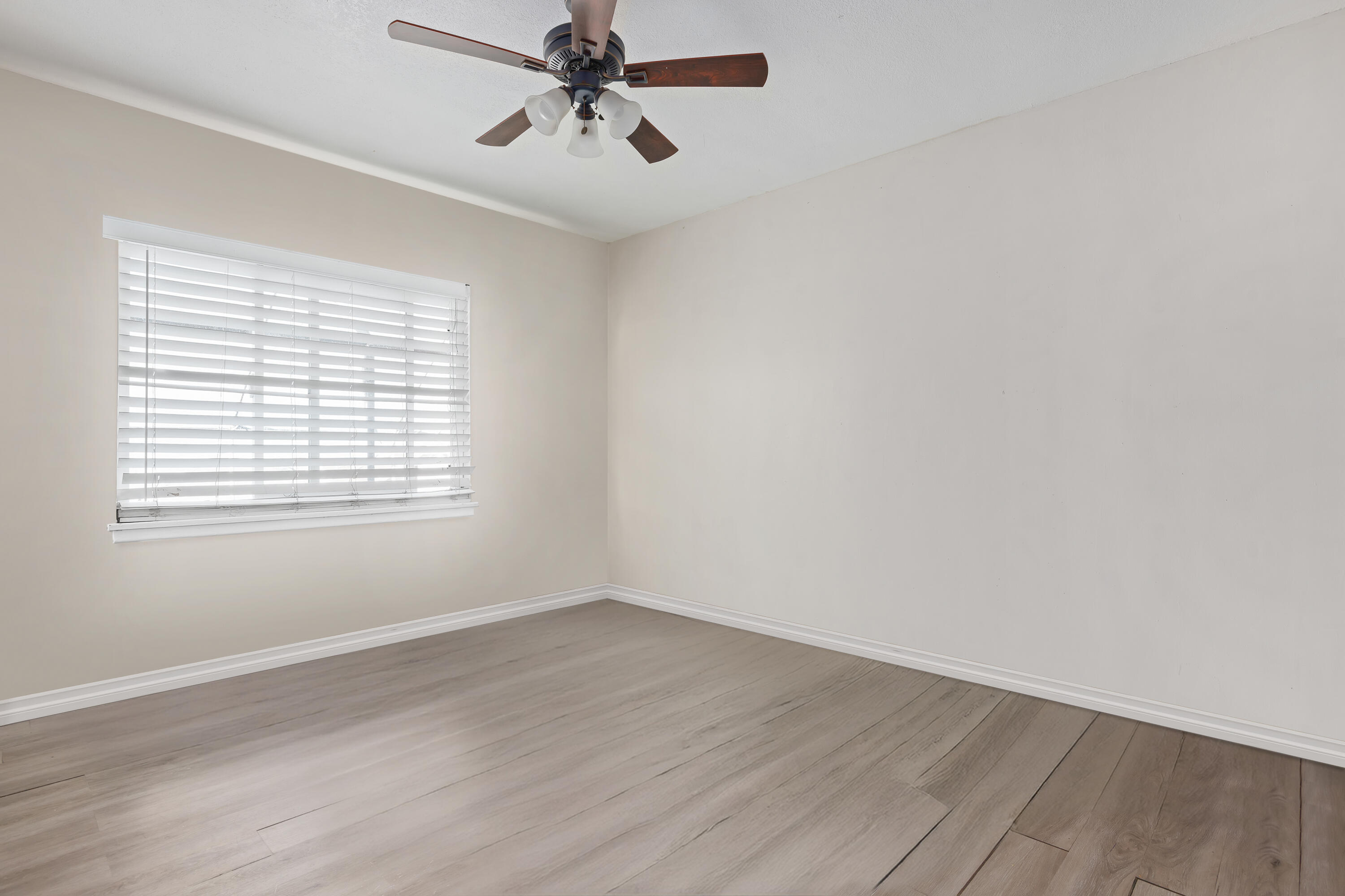 901 West Olive Street Oxnard, CA 93033 - Photo 10 of 20 a view of a room with wooden floor and windows