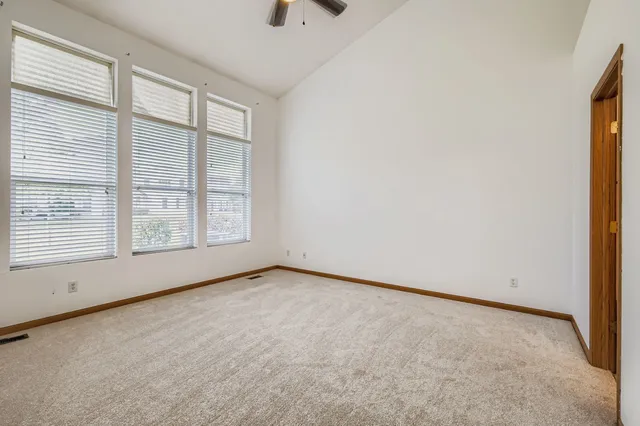 an empty room with windows