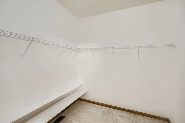 a view of a room with racks on the wall