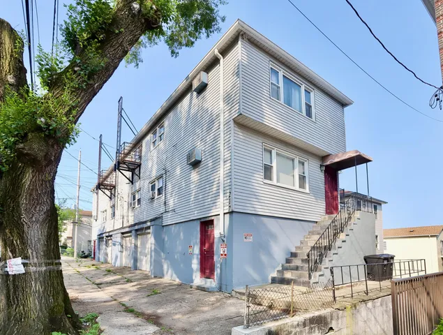a front view of a house with street