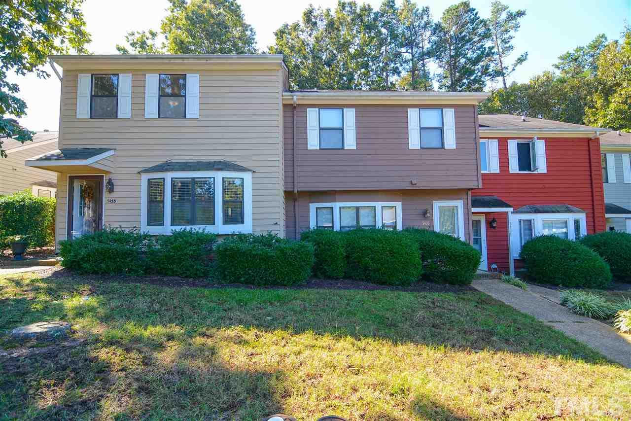 5433 Pine Top Circle Raleigh, NC 27612 - Photo 2 of 23 a front view of a house with a garden