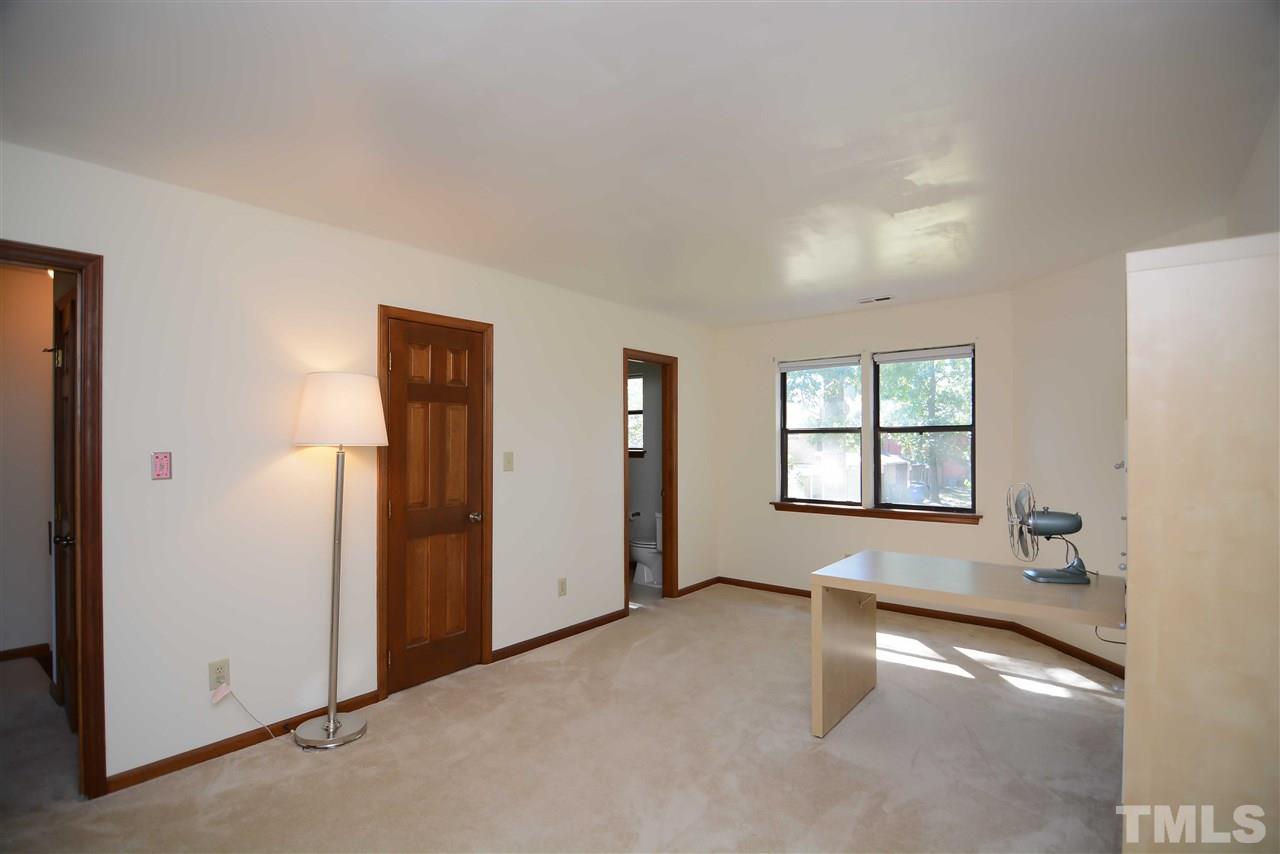 5433 Pine Top Circle Raleigh, NC 27612 - Photo 19 of 23 an empty room with windows and closet