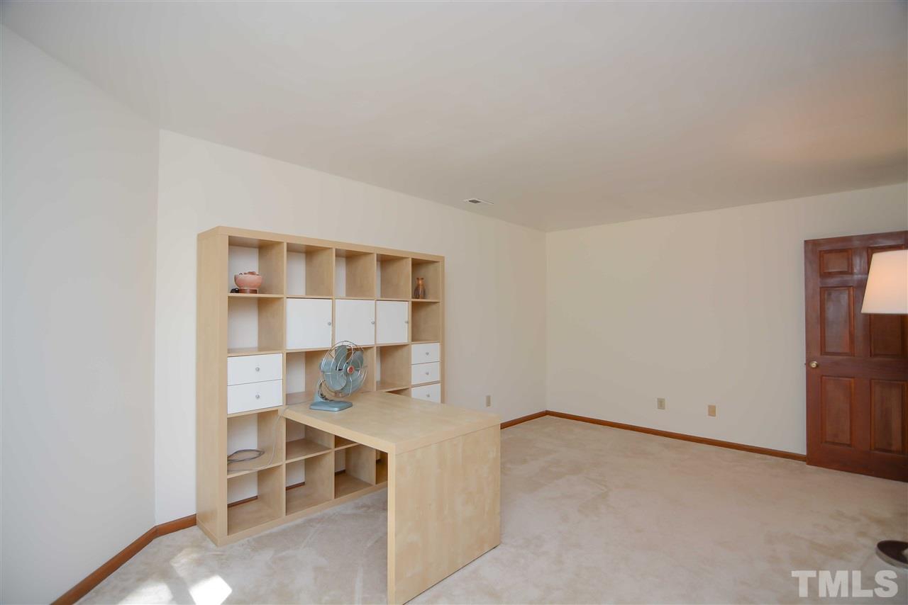 5433 Pine Top Circle Raleigh, NC 27612 - Photo 20 of 23 a view of workspace with wooden floor and entryway