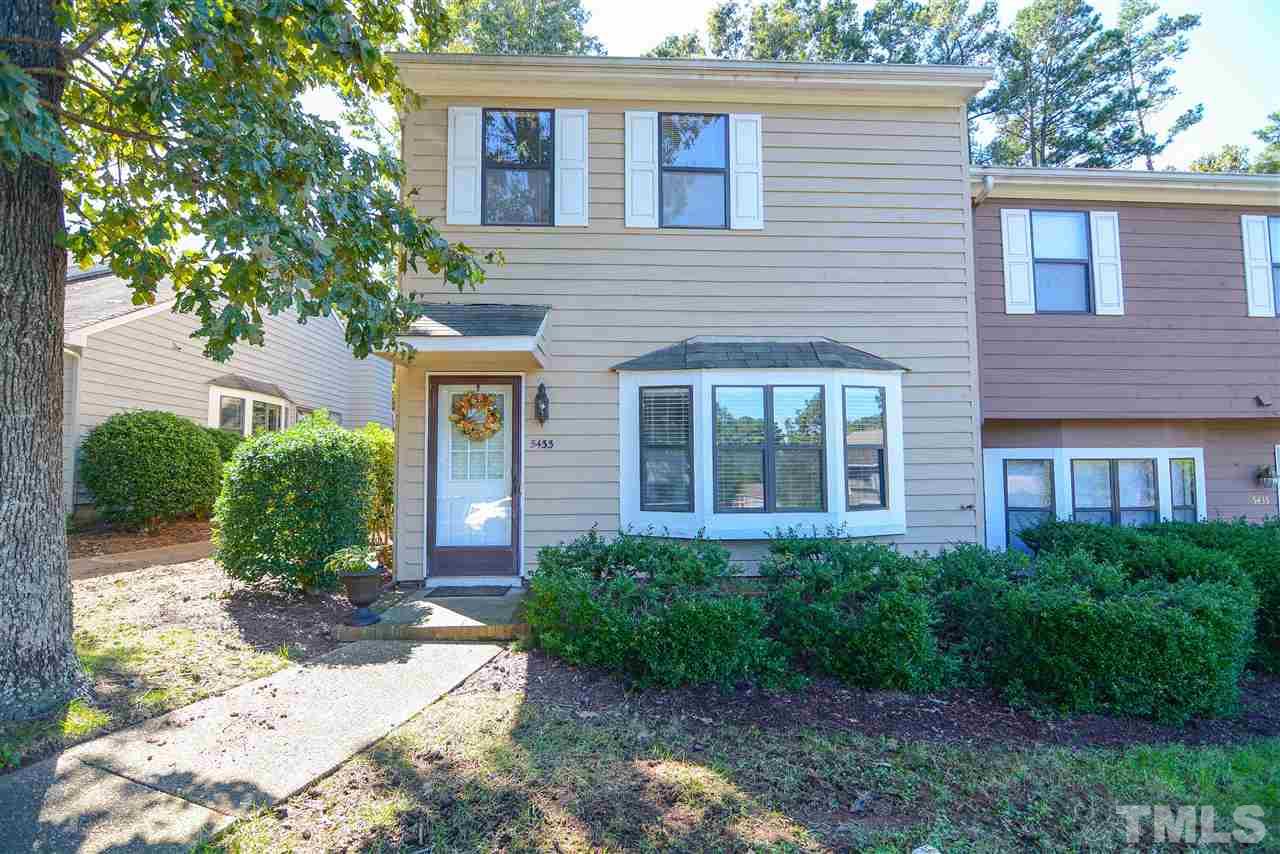 5433 Pine Top Circle Raleigh, NC 27612 - Photo 23 of 23 a front view of a house with garden