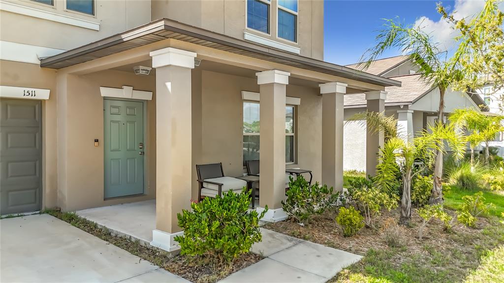 1511 Tiger Tooth Place Ruskin, FL 33570 - Photo 4 of 59 a view of a house with potted plants