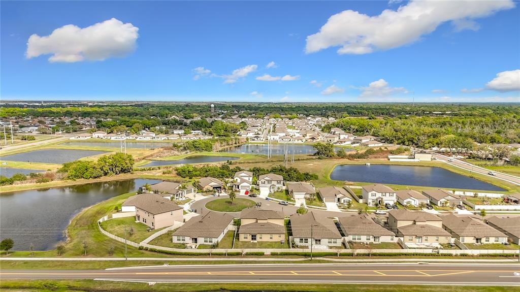 1511 Tiger Tooth Place Ruskin, FL 33570 - Photo 58 of 59 a view of an ocean and a building