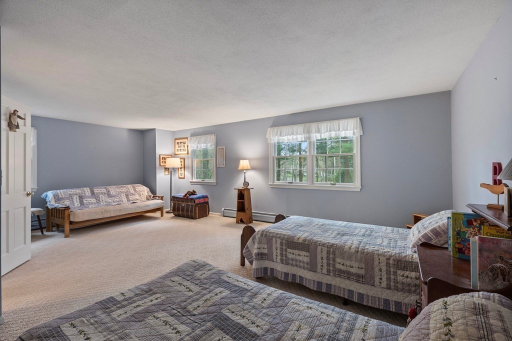 1 Conifer Drive Wilbraham, MA 01095 - Photo 23 of 42 a bedroom with double bed and a window