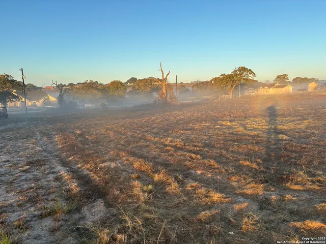 a view of a lake in a sunset