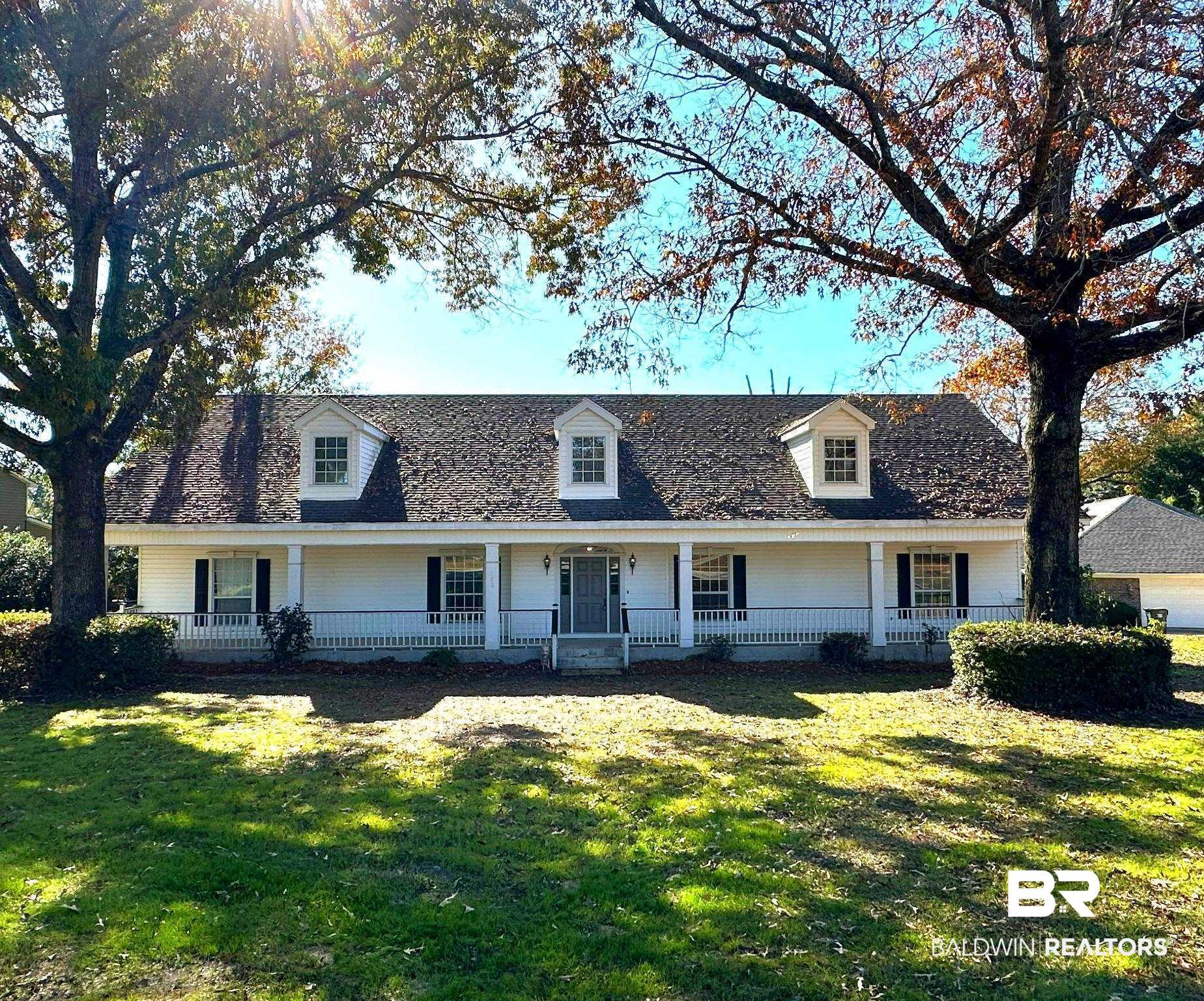 100 Orleans Way Daphne, AL 36526 - Photo 3 of 31 Cape cod house featuring covered porch and a front lawn