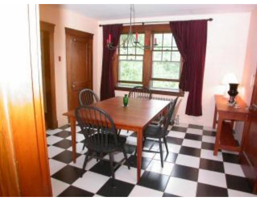 5 Longview Street Natick, MA 01760 - Photo 2 of 12 a dining room with a table and chairs