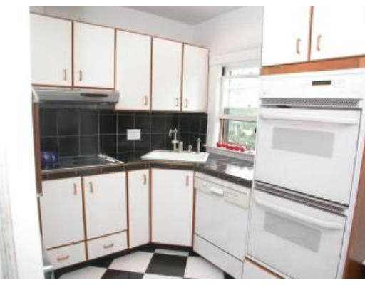 5 Longview Street Natick, MA 01760 - Photo 3 of 12 a kitchen with white cabinets and white appliances