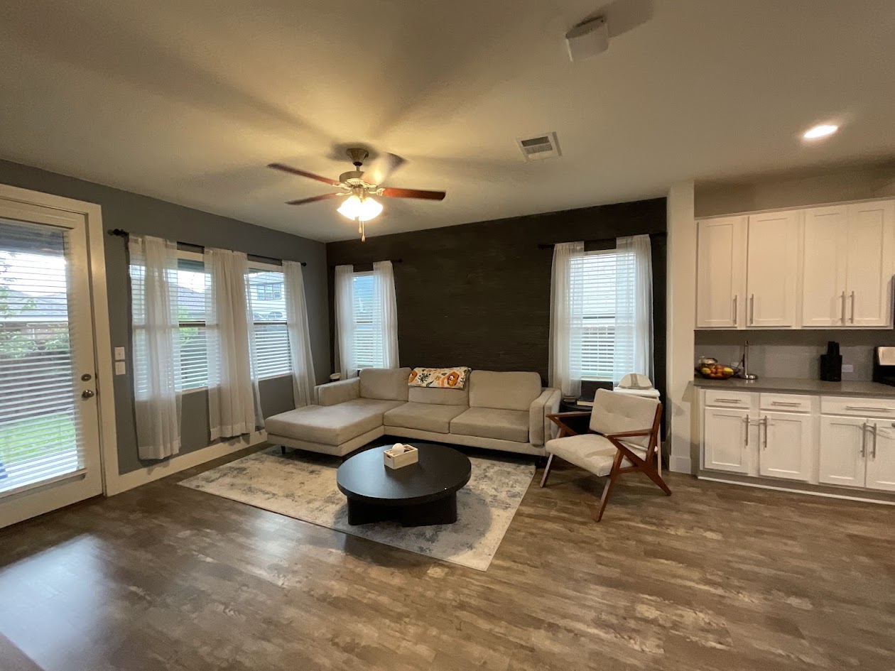624 Golden Glory Road Leander, TX 78641 - Photo 16 of 39 Open concept living area with wood-finish flooring