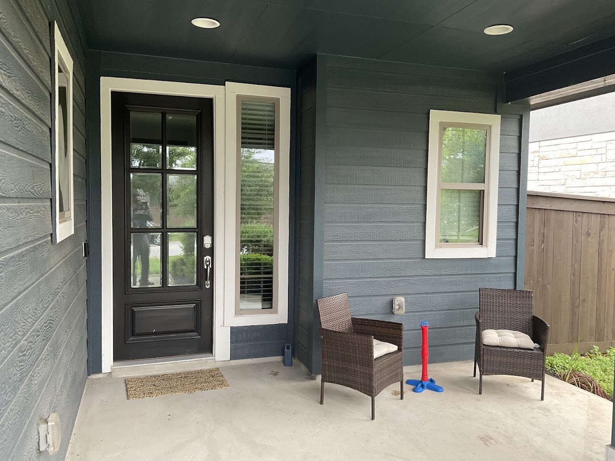 624 Golden Glory Road Leander, TX 78641 - Photo 32 of 39 Inviting covered porch with concrete flooring and dark gray horizontal siding