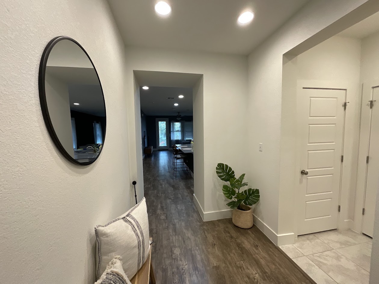 624 Golden Glory Road Leander, TX 78641 - Photo 4 of 39 Entryway featuring recessed lighting, wood-finish flooring, and white paneled doors