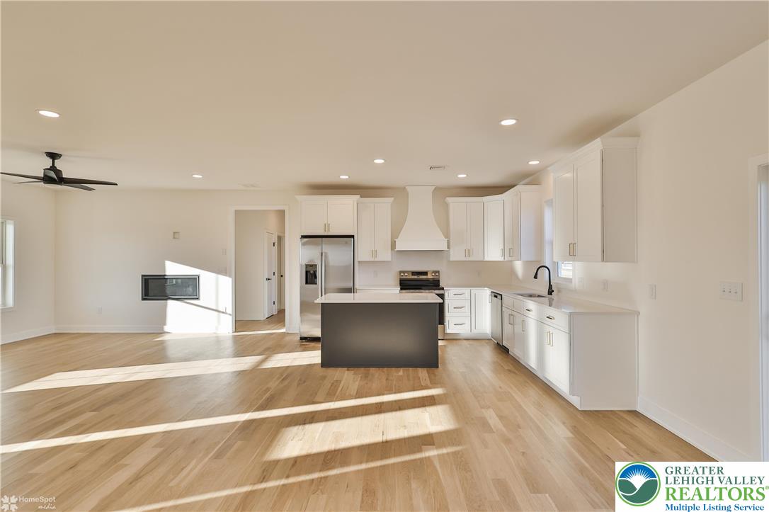 464 Long Lane Road Walnutport, PA 18088 - Photo 23 of 50 a view of kitchen with stainless steel appliances kitchen island microwave and cabinets