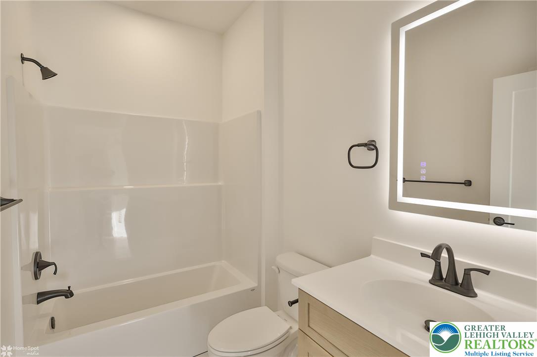 464 Long Lane Road Walnutport, PA 18088 - Photo 30 of 50 a bathroom with a sink toilet and bathtub